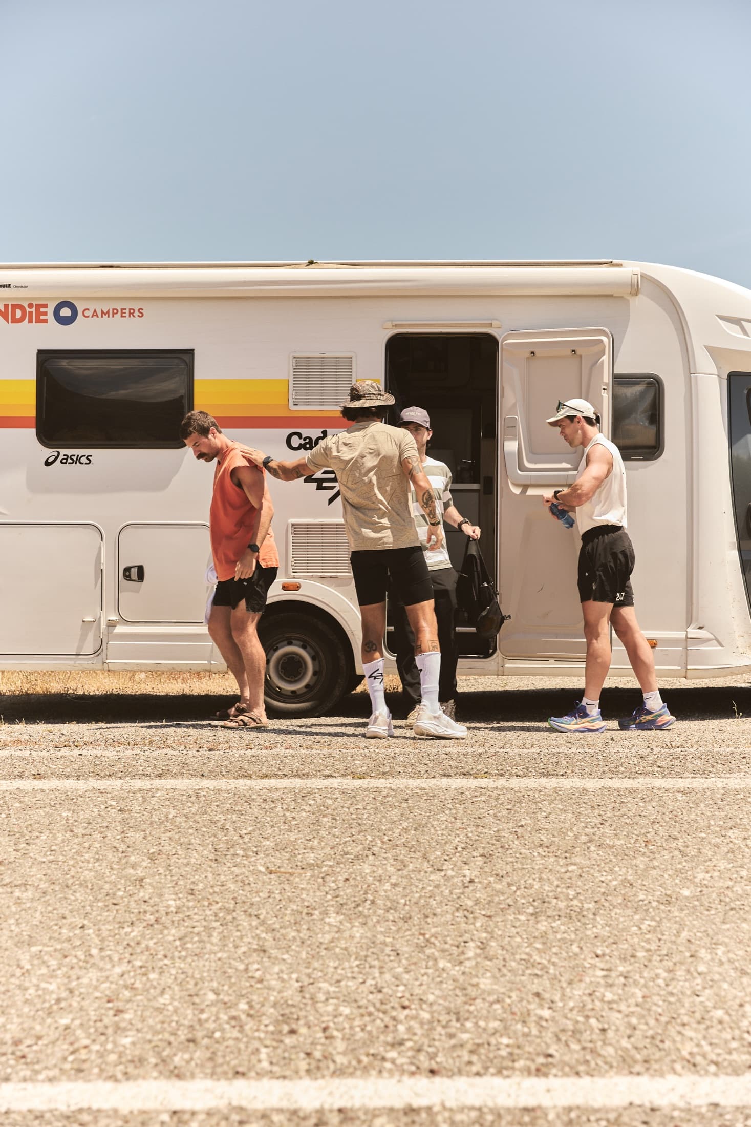 The support crew coordinating beside the Greece camper